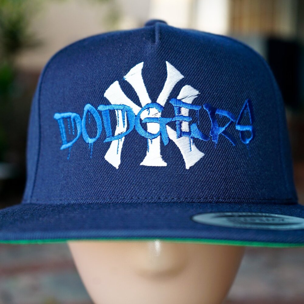 Los Angeles LA Dodgers Graffiti Over New York NY Yankees World Series Hat